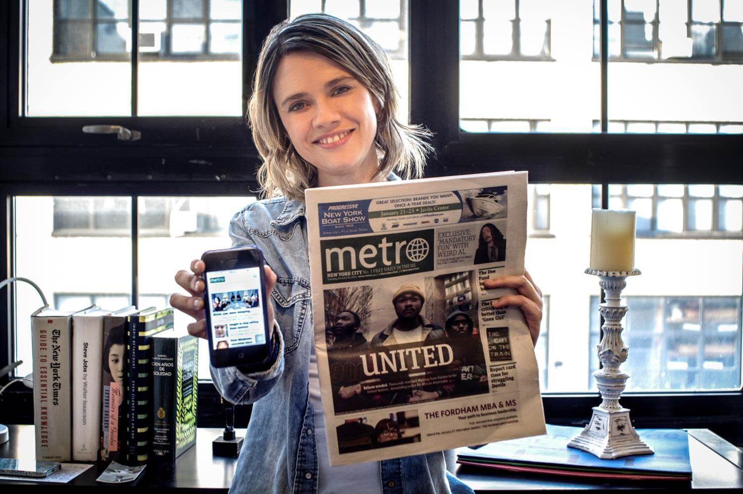 Laura reading Metro